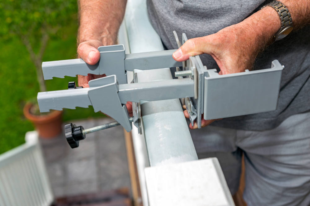 Lookout Screens patented clamp attached to balcony railing